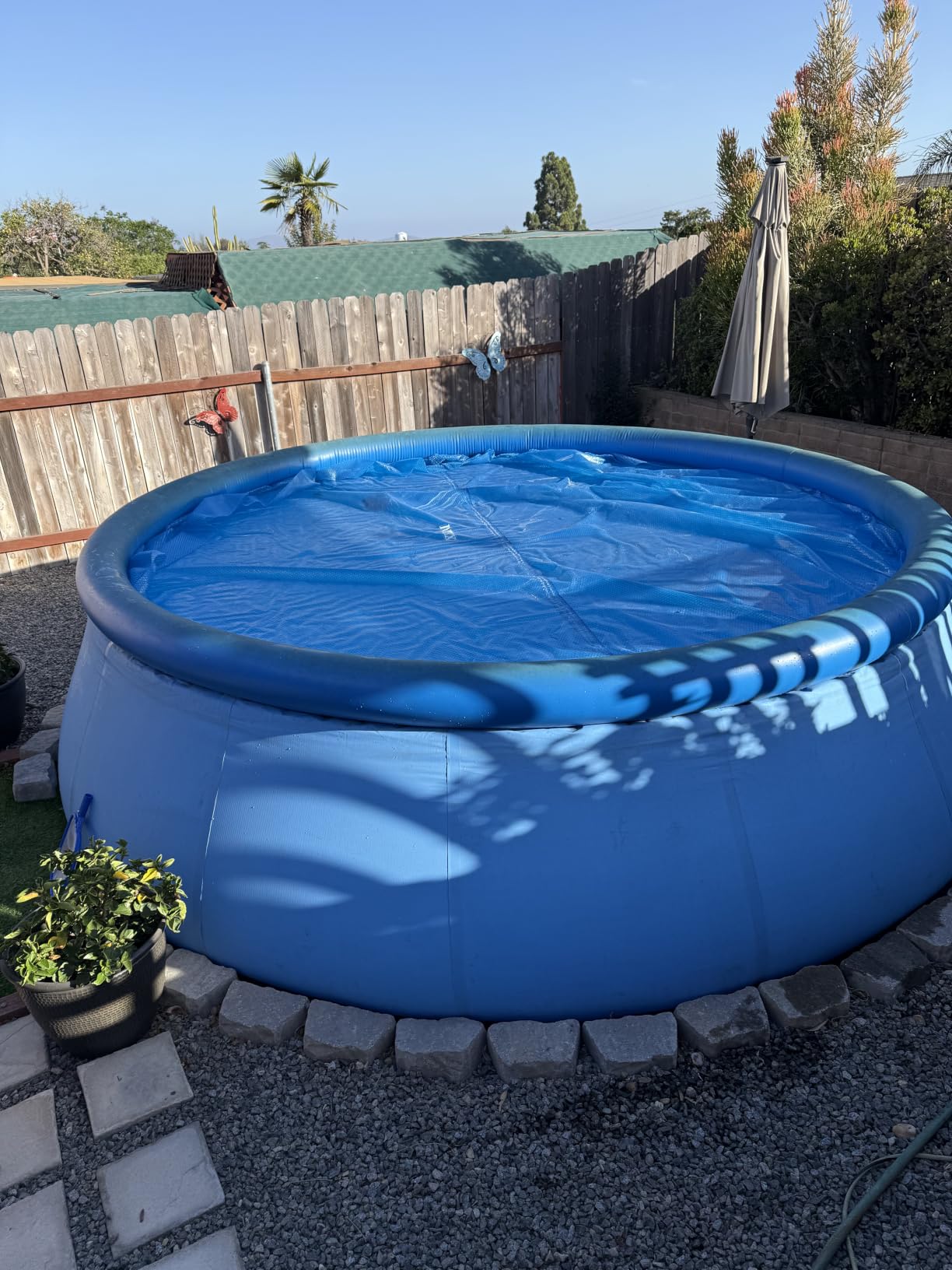 INTEX 28014E Solar Pool Cover: for 16ft Round Easy Set and Metal Frame Pools - Insulates Pool Water - Reduces Water Evaporation - Keeps Debris Out - Reduces Chemical Consumption customer photo 2