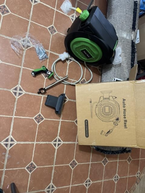 Retractable Garden Hose Reel, 1/2 in x 100 ft Automatic Slow Rewind System & Any Length Lock, Heavy Duty Wall-Mounted Hose Reel with 180° Swivel Bracket,10-Pattern Nozzle customer photo 2