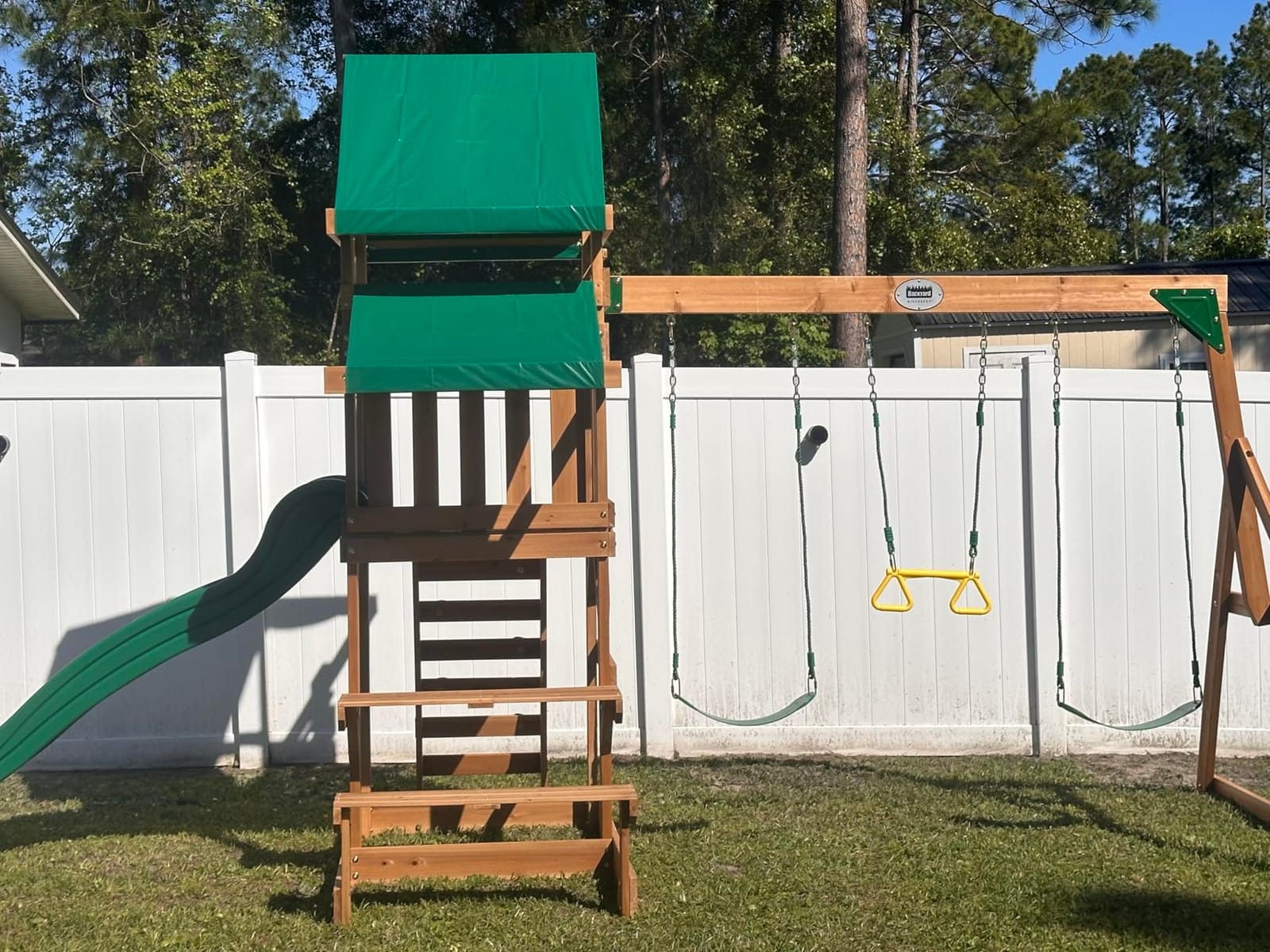 Backyard Discovery Belmont Cedar Wood Swing Set with Wave Slide, Play Deck, Rock Wall Ladder, Snack Bar Window, Shaded Picnic Area, Bench, Belt Swings, Trapeze, Sandbox Area, Canopy, Outdoor Playset customer photo 2