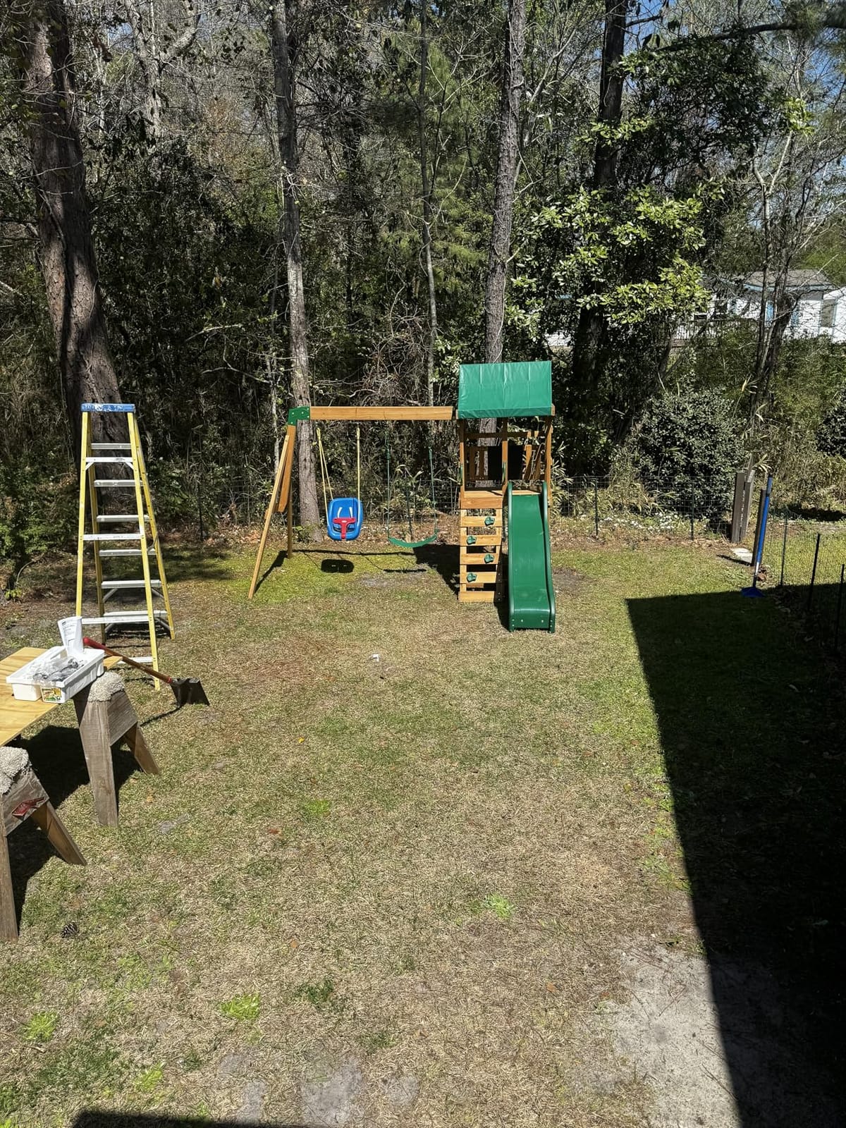 Backyard Discovery Buckley Hill Cedar Wood Swing Set with Wave Slide, Play Deck, Rock Wall Ladder, Belt Swings, Chalkboard, Canopy Roof, Outdoor Playset customer photo 1