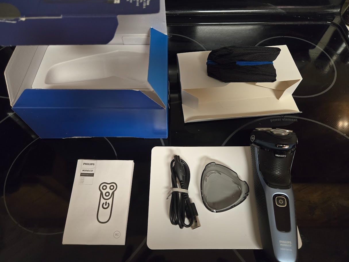 Philips Norelco 3600 Electric Shaver, Storm Blue | 27 Self Sharpening ComfortCut Blades, 5D Pivot & Flex Heads, Wet or Dry Use, Includes Travel Pouch, S3243/91 customer photo 1