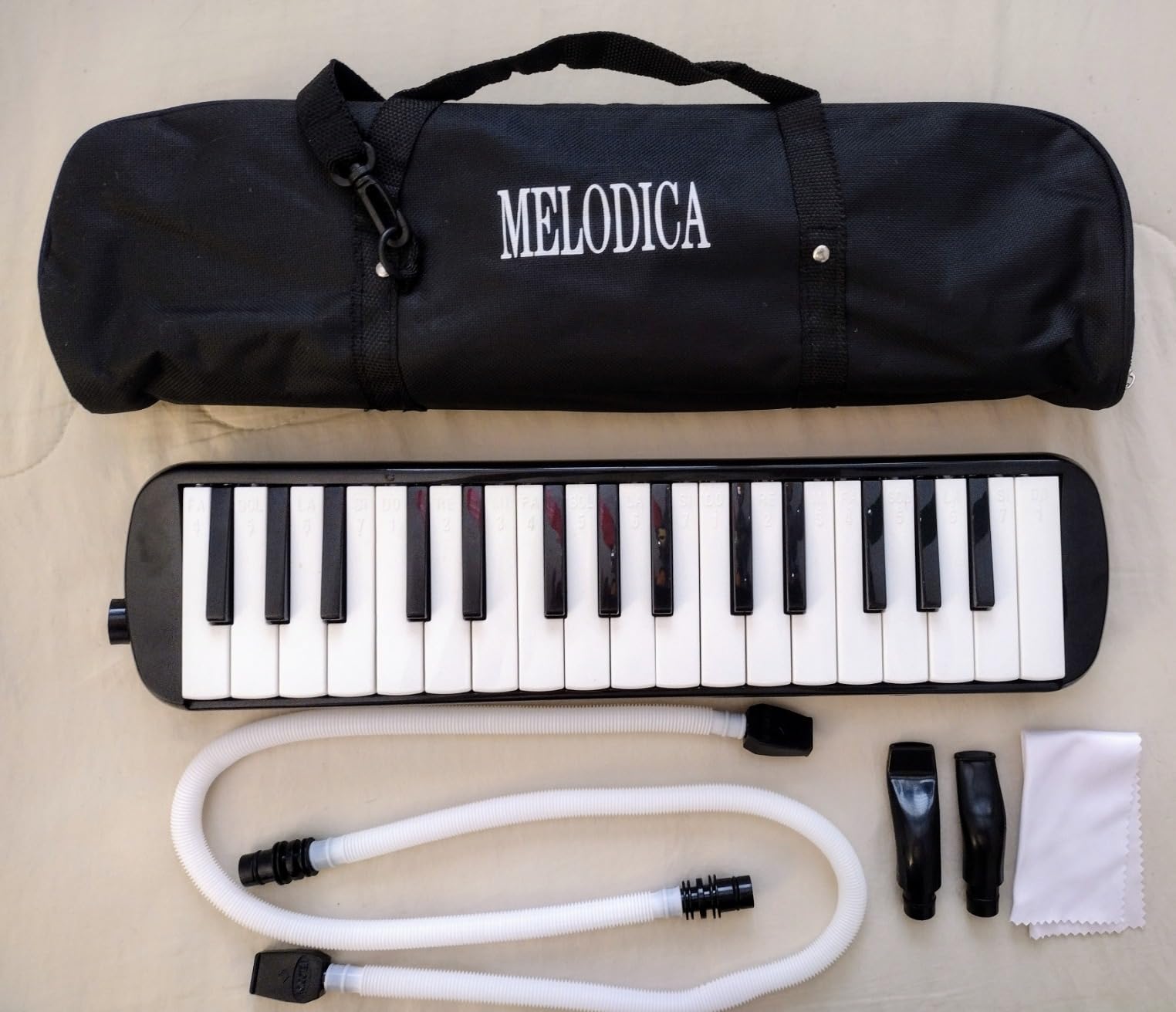 Tosnail 32 Key Melodica with Carrying Bag, Double Tubes Mouthpieces, Wipe Cloth, Air Piano Keyboard Musical Instrument for Beginners, Adults - Black customer photo 1