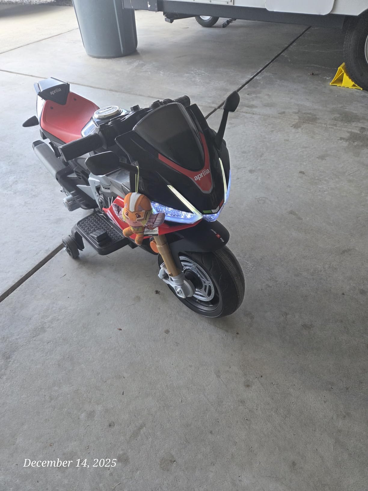 TCARAIWEN 24V Electric Motorcycle for Kids, Ride On Toys for 4-10 Years Old | Aprilia Licensed Motor Bike, Speed Up to 8mph, Training Wheels, Bluetooth and Mp3, Toddler Motorcycle for Girls Boys, Black customer photo 1