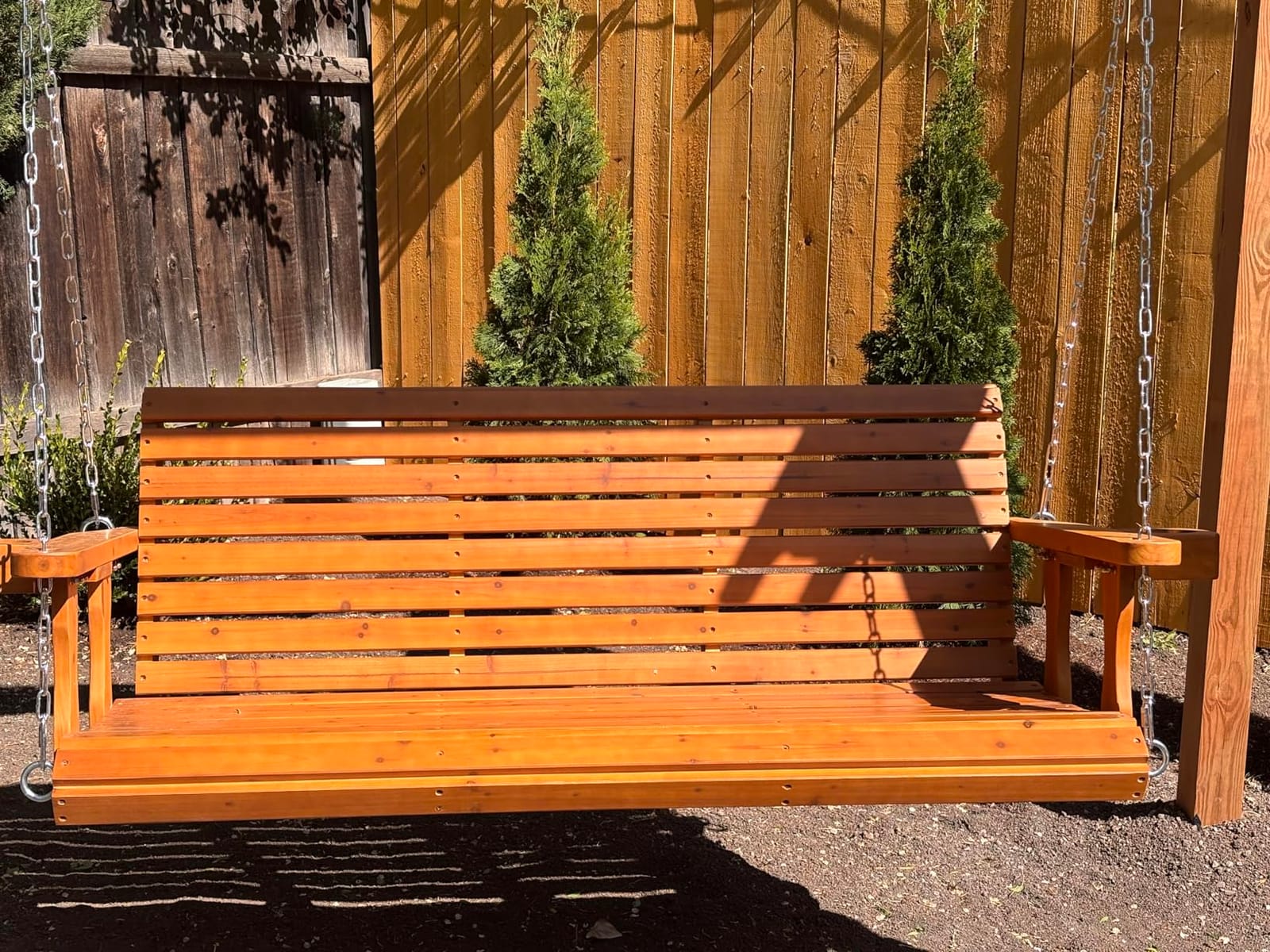 Wooden Porch Swing 2-Seater, High Backrest and Deep Seat, Bench Swing with Cupholders, Hanging Chains and 7mm Springs, Heavy Duty 880 LBS, for Outdoor Patio Garden (Cedar Tone - 4 FT Extra Large) customer photo 2