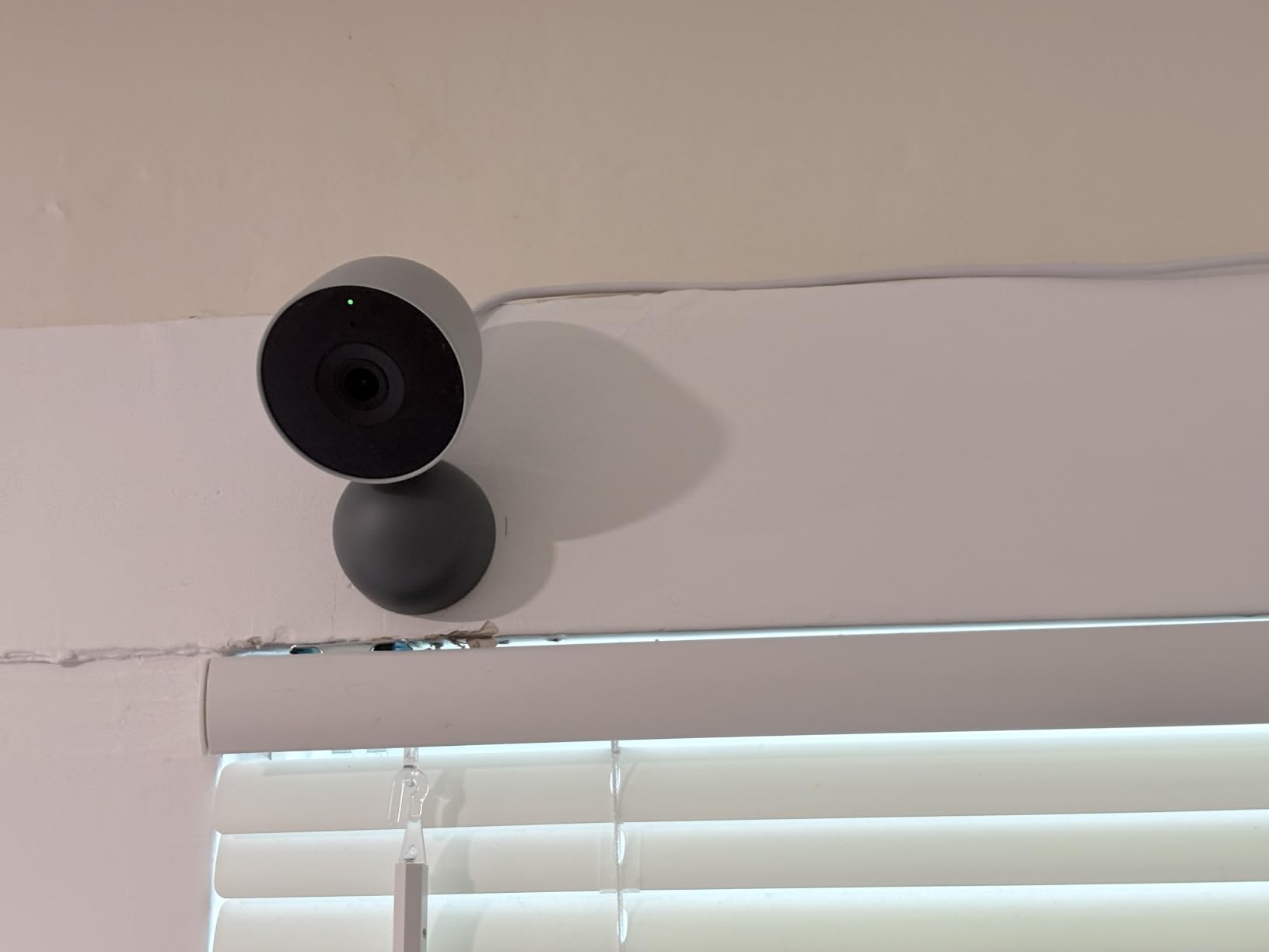 Google Nest Cam Indoor (Wired, 3rd Gen) - Security Camera - 2025 - Snow | 2K video, motion detection, color night vision, 2-way audio, works with Google Home and Gemini, intelligent alerts customer photo 1