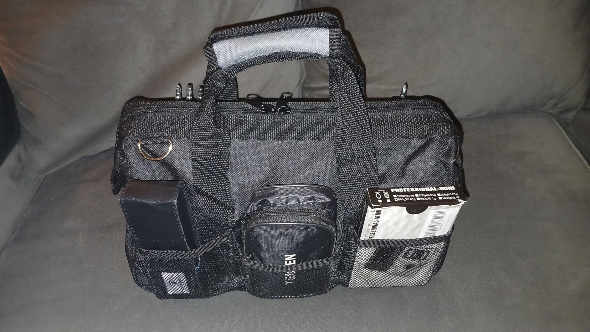 Amazon Basics Durable Wear-Resistant Tool Storage Bag with Adjustable Shoulder Strap, Portable Tool Organizer, 16 Pockets, 12 in, Black & Gray customer photo 2