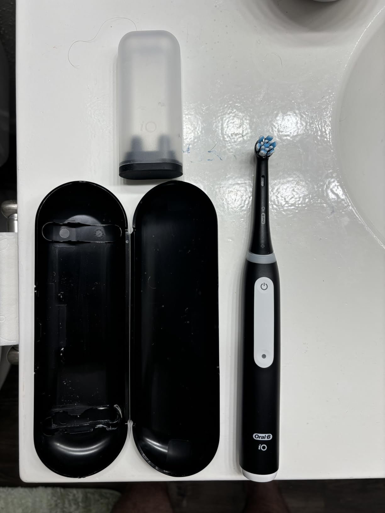 Oral-B iO Series 3 Limited Deep Clean Rechargeable Electric Toothbrush for Adults, Black, 3 Modes, Smart Pressure Sensor, Plaque Removal and Gum Care, 2 Replacement Brush Heads, Travel Case customer photo 1