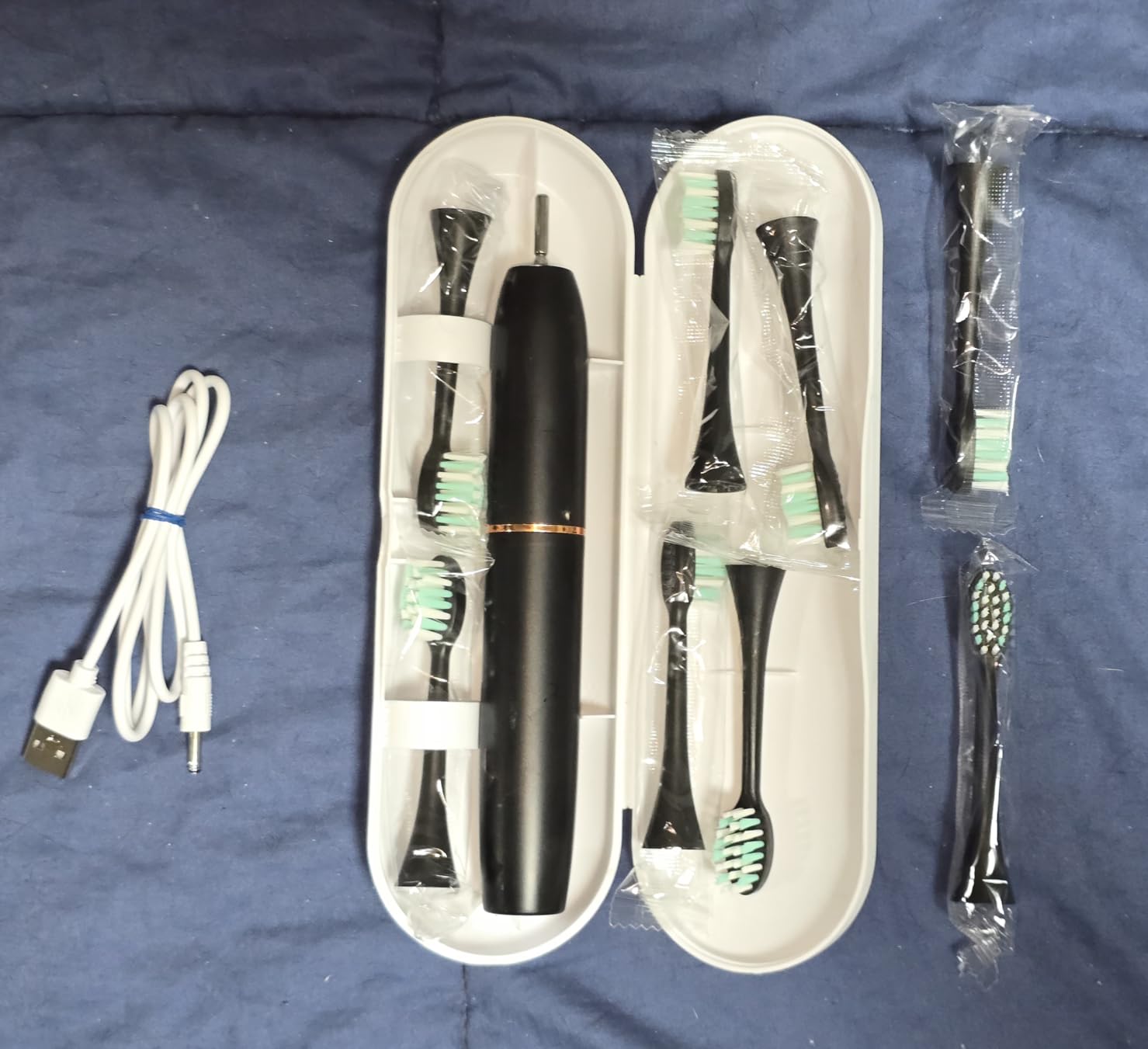 kingheroes Electric Toothbrush Set, Comes with 8 Brush Heads & Travel Case,4 Modes with 2 Minutes Built in Smart Timer, One Charge for 60 Days, 42000 VPM Motor (Purple) customer photo 1