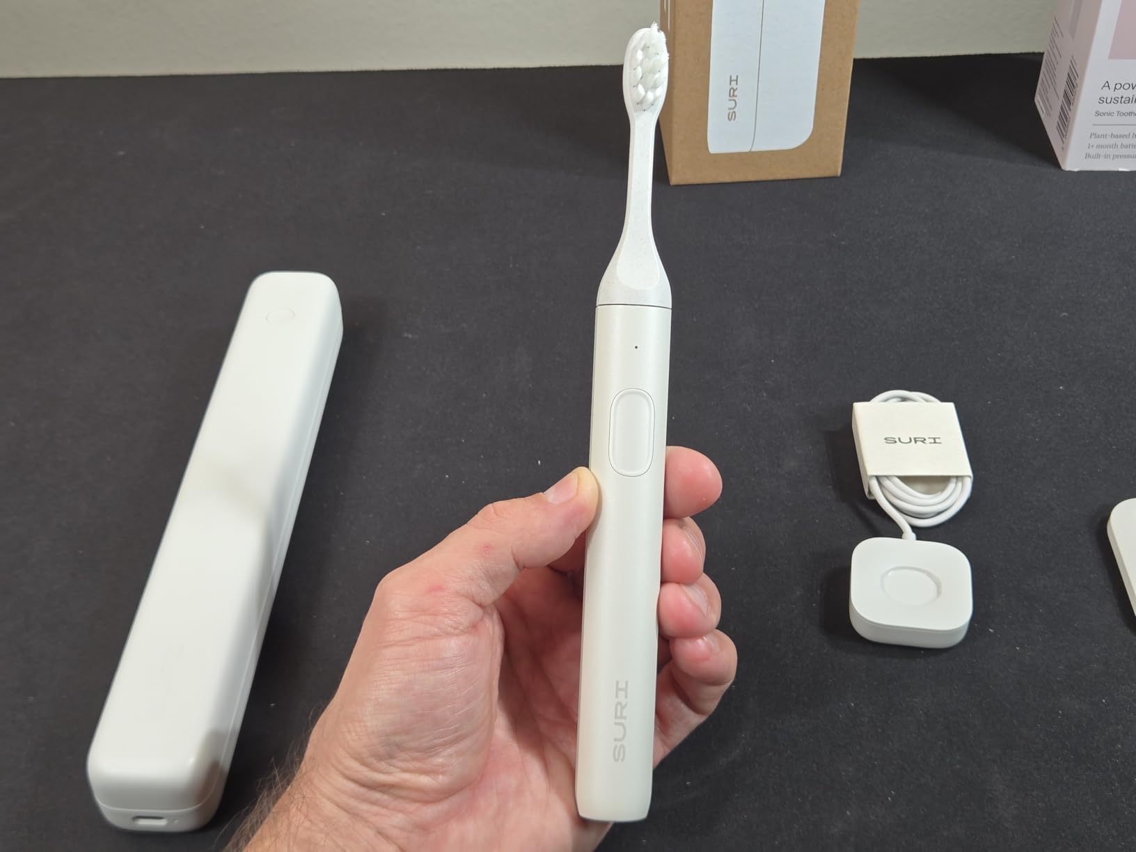 SURI Pro Sonic Electric Toothbrush | Over 4+ Weeks Battery | UV Cleaning Travel Case | Pressure Sensor | Aluminium Body | 2-Minute Timer | Plant-Based Heads | Green customer photo 2