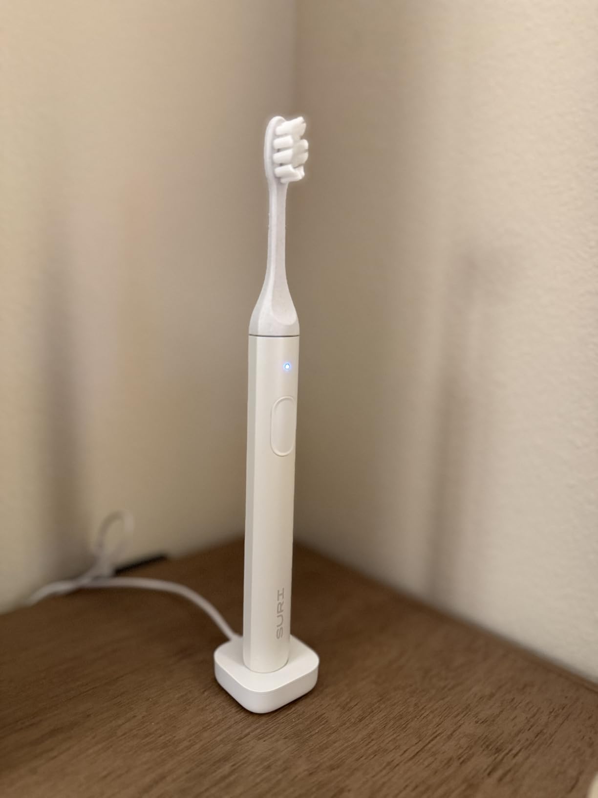 SURI Pro Sonic Electric Toothbrush | Over 4+ Weeks Battery | Pressure Sensor | Aluminium Body | 2-Minute Timer | Plant-Based Head | Green customer photo 1