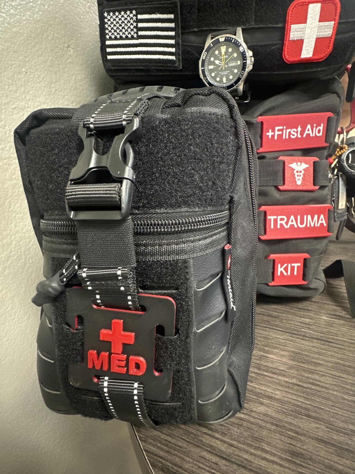Survival First Aid Kit with Israeli Bandage, Chest Seal, Tourniquet, Splint, Tactical Military Combat Molle IFAK for Wound Care, Bleeding Control, Trauma Hemorrhage and More (Red) customer photo 1